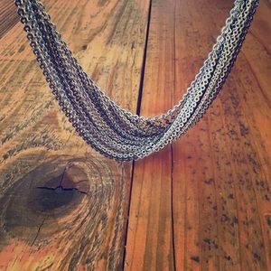 Silver, gold, gun metal grey multi chain necklace